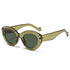 Playpark Claire Sunglasses feature a vintage cat eye with thick frames made from recycled materials and 400 UV protection - featured colour green.