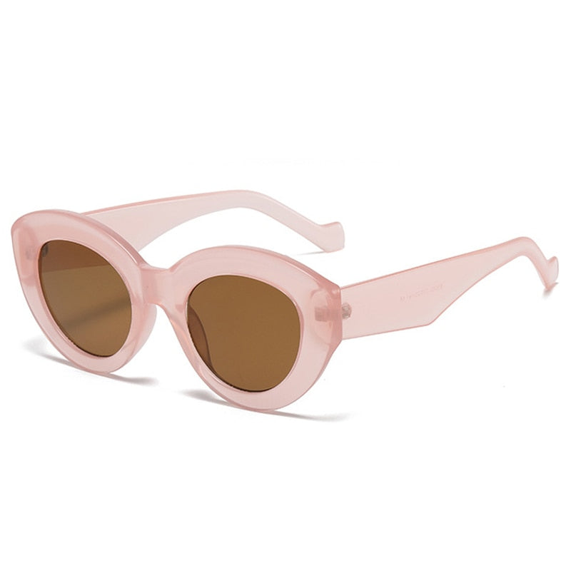 Playpark Claire Sunglasses feature a vintage cat eye with thick frames made from recycled materials and 400 UV protection - featured colour pink.