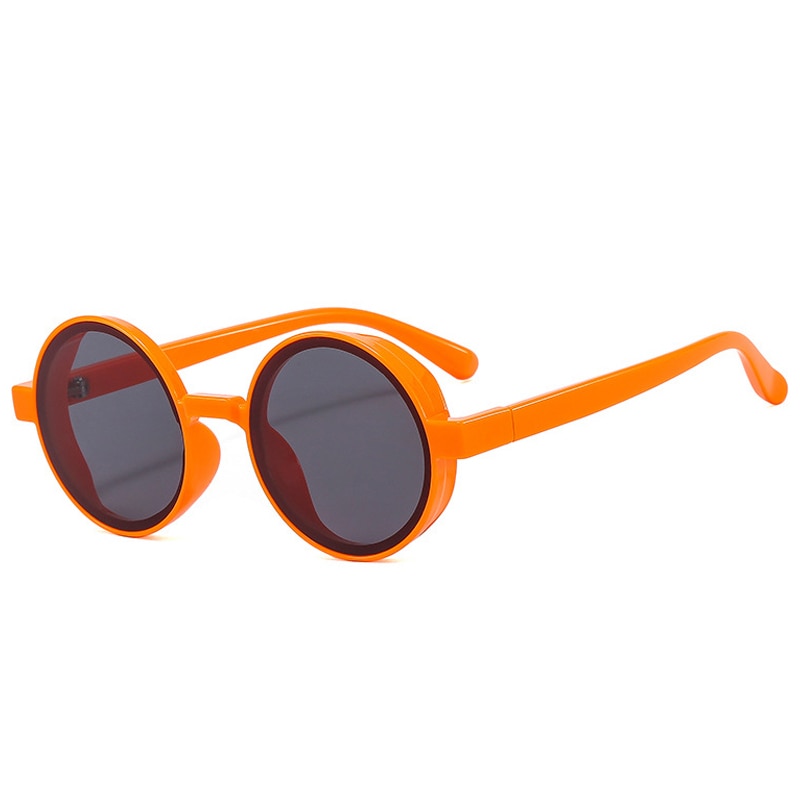 Our popular Playpark Bobby Sunglasses come in orange and feature round frames made from recycled materials and 400 UV protection.