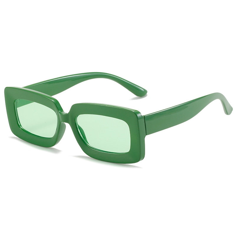 Playpark Alexa Sunglasses with transparent green tint lenses and solid dark green coloured frames are made from 100% recycled plastic with UV400 protection lenses.