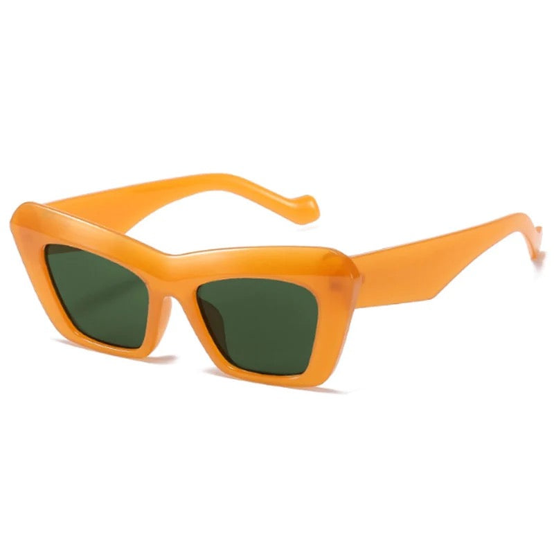 Playpark cat eye vintage style sunglasses in orange, made from recycled materials and 400 UV protection.