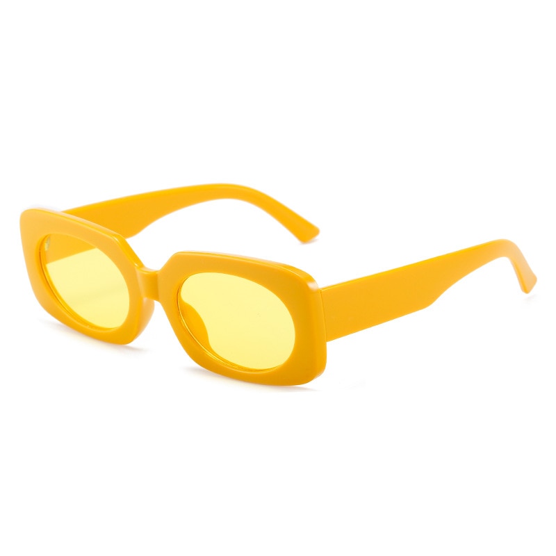 Playpark Atlas Sunglasses feature vintage style shapes and light orange transparent lenses and solid orange / yellow colour frames. Made from recycled materials and 400 UV protection.