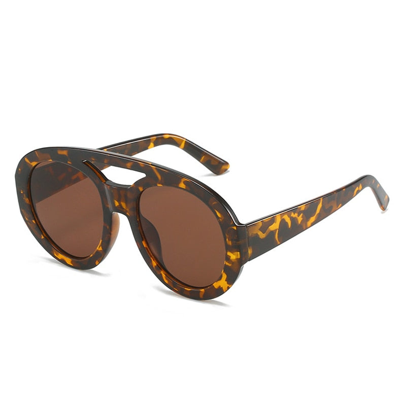 Playpark Arthur Sunglasses features an all torte shell frame with dark brown lenses. Trending and stylish sunglasses, these are made with 400UV protection lenses and recycled materials.