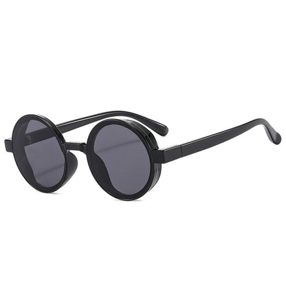 Our popular Playpark Bobby Sunglasses come in black and feature round frames made from recycled materials and 400 UV protection. 