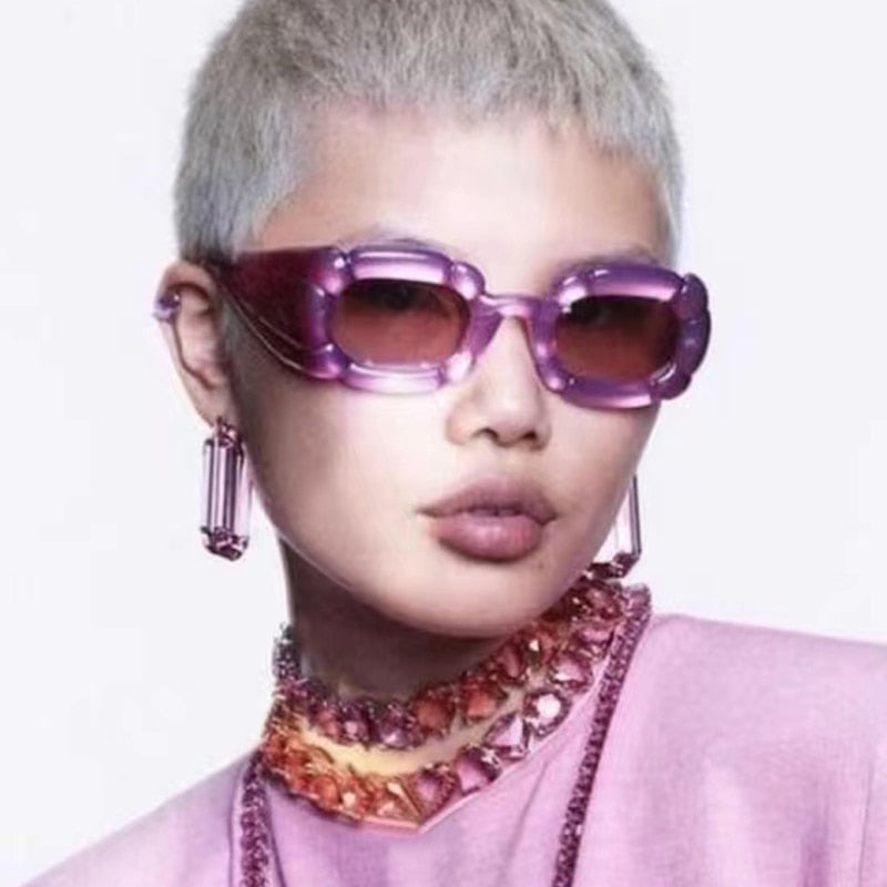 Model wearing sunglasses from Playpark Cloud frame collection in purple. 