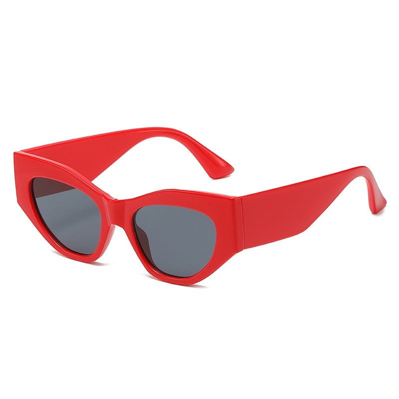 Playpark Asteroid Sunglasses features a cat eye style frame with transparent lenses and solid bright red colour frames. Made from 100% recycled materials and 400 UV protection lenses.