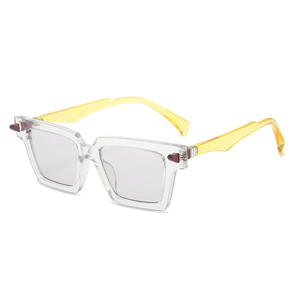 Playpark Sunglasses with clear lenses and frames. The Lenses are transparent and the arms are yellow. UV 400 Protection and made from recycled materials.