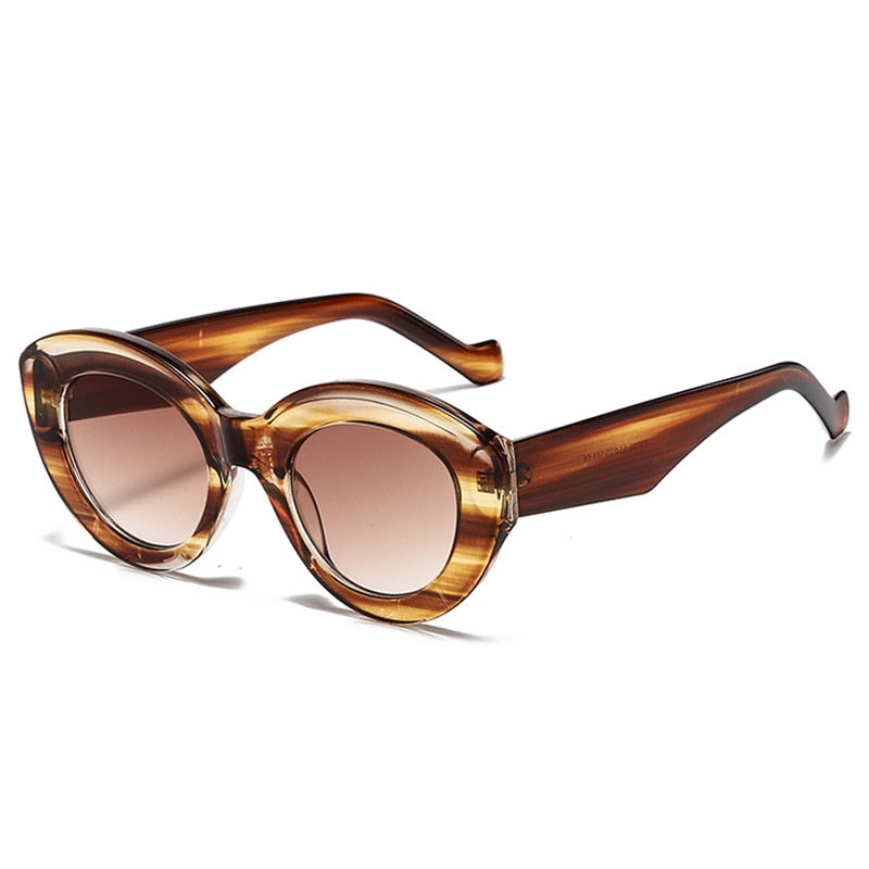 Playpark Claire Sunglasses feature a vintage cat eye with thick frames made from recycled materials and 400 UV protection - featured colour brown. 