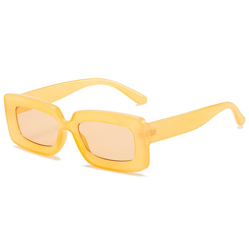 Playpark Alexa Sunglasses with transparent beige lenses and solid yellow candy coloured frames are made from 100% recycled plastic with UV400 protection lenses. 