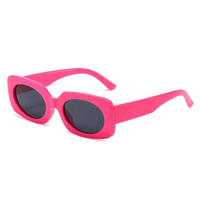 Playpark Atlas Sunglasses feature vintage style shapes and black transparent lenses and solid hot pink colour frames. Made from recycled materials and 400 UV protection.