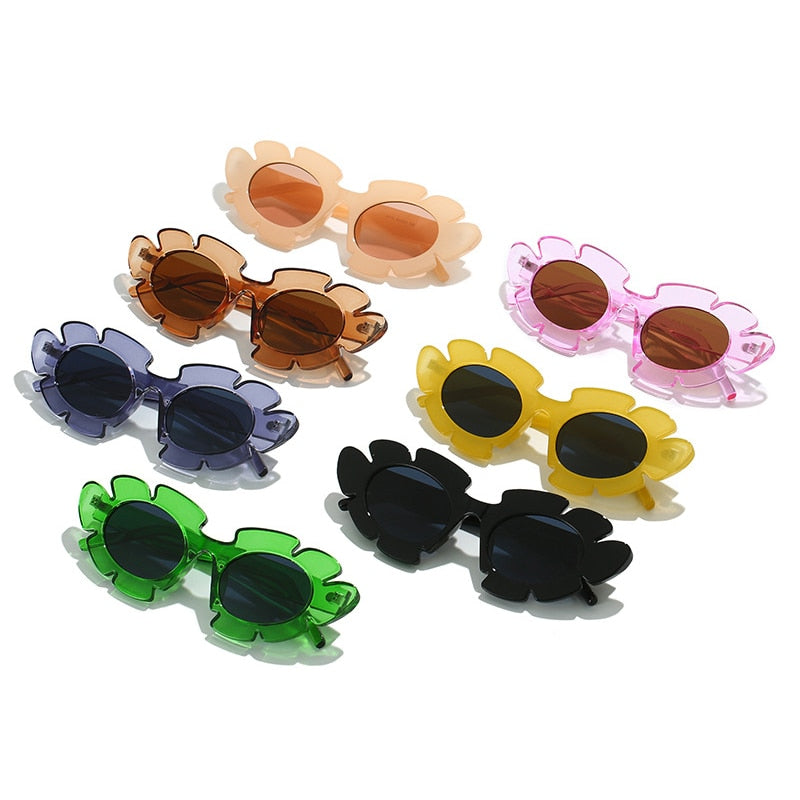 The full range of our Playpark Bloom Sunglasses in all of the colours it comes in. Made from recycled materials and 400UV protection. 