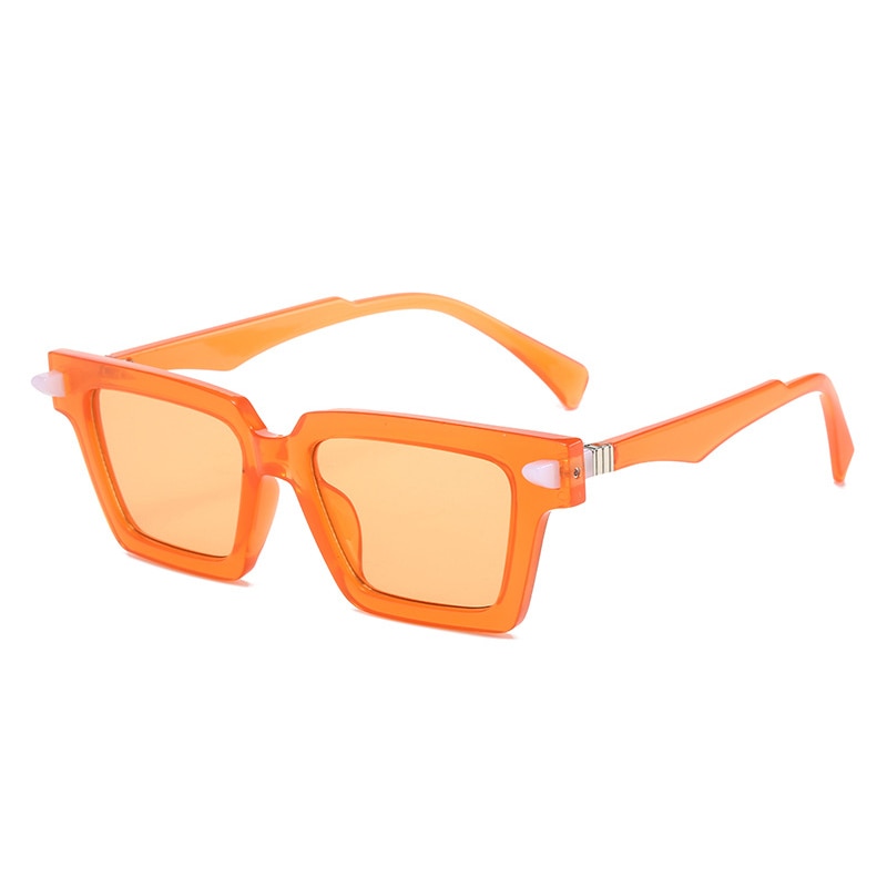 Playpark Sunglasses with clear lenses and frames. The Lenses are transparent orange and the arms and frame is also orange. UV 400 Protection and made from recycled materials.