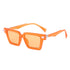 Playpark Sunglasses with clear lenses and frames. The Lenses are transparent orange and the arms and frame is also orange. UV 400 Protection and made from recycled materials.