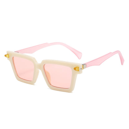 Playpark Sunglasses with clear pink lenses and frames. The Lenses are transparent pink and the arms are pink with cream coloured frames. UV 400 Protection and made from recycled materials.