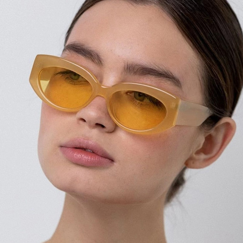 Playpark model feature our Cara sunglasses in orange.