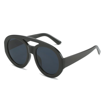 Playpark Arthur Sunglasses features an all black frame with dark black lenses. Trending and stylish sunglasses, these are made with 400UV protection lenses and recycled materials.