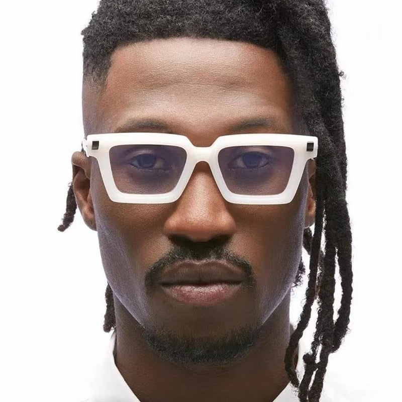 Playpark Studio modelling our Aaron Frame sunglasses in transparent white and black..